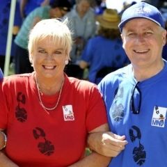 woman in red tshirt linking arms fundraising manager